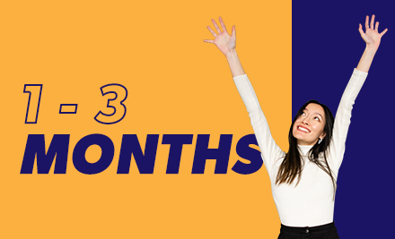 1-3 months with a graduate celebrating with their arms in the air
