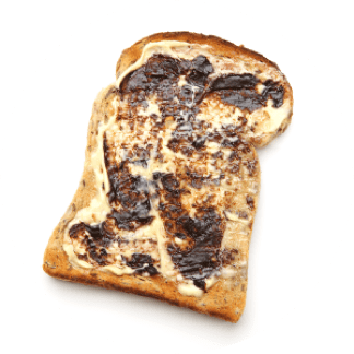 A piece of vegemite on toast